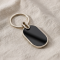 Elegant Black & Silver Oval Metal Keychain (1 Pc)